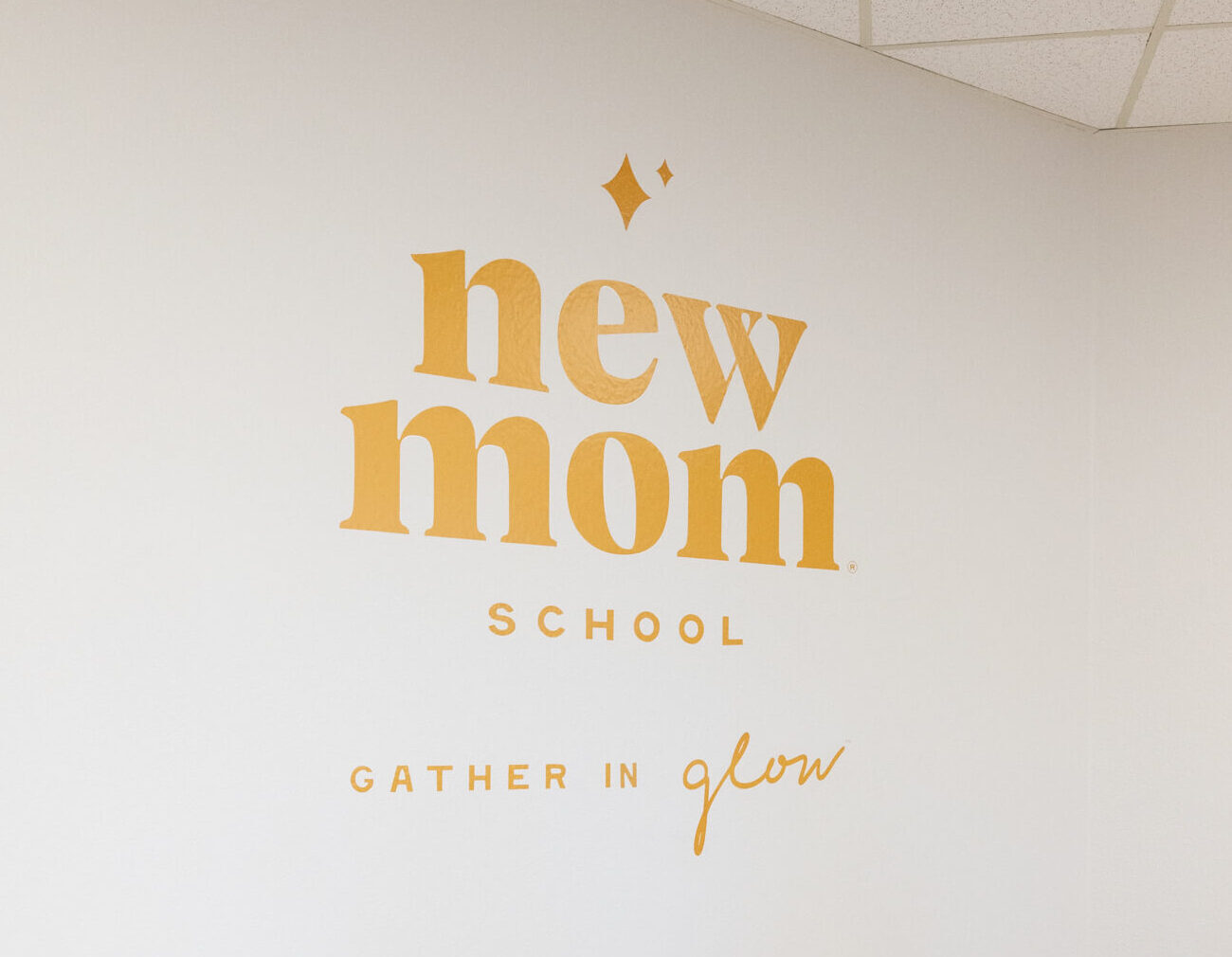 Logo wall inside the New Mom School in Encinitas, CA