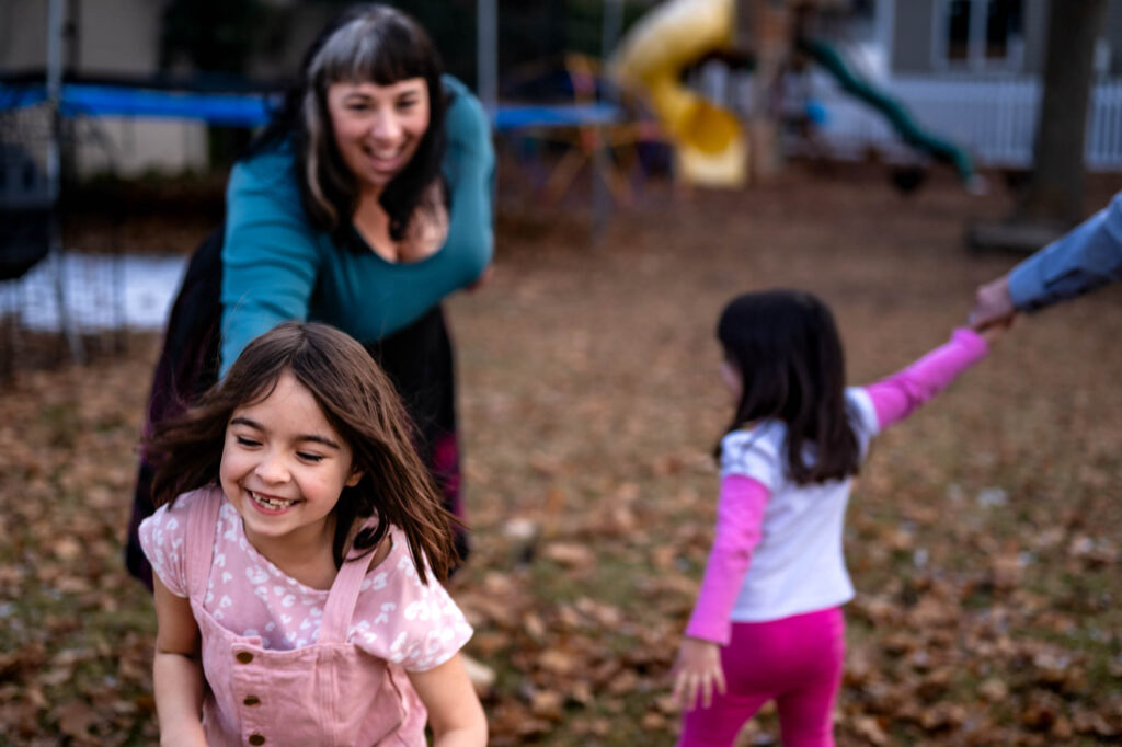Authentic family portrait with natural smiles and laughter make for the perfect family photos