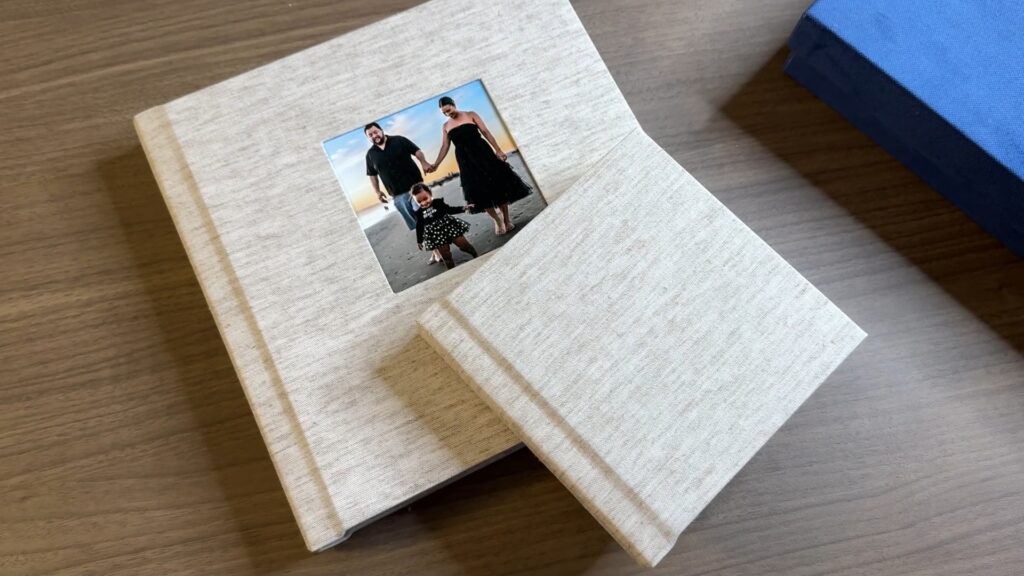 Family photo album from a professional portrait session on the beach with Babies and Beauties Photography.