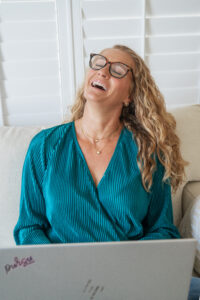 Client laughs during personal branding photoshoot